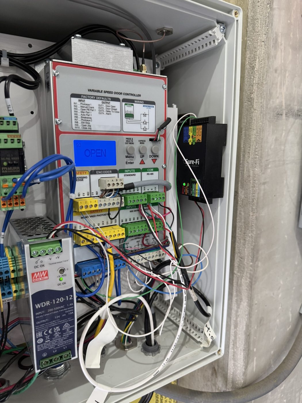 Control cabinet with power supply and wiring