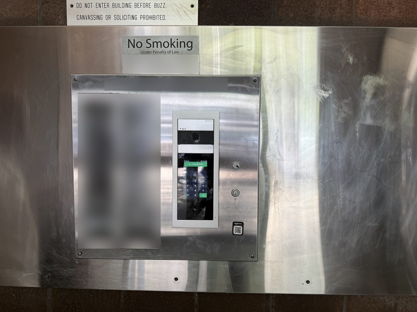 Directory and video entry panel at a building entrance